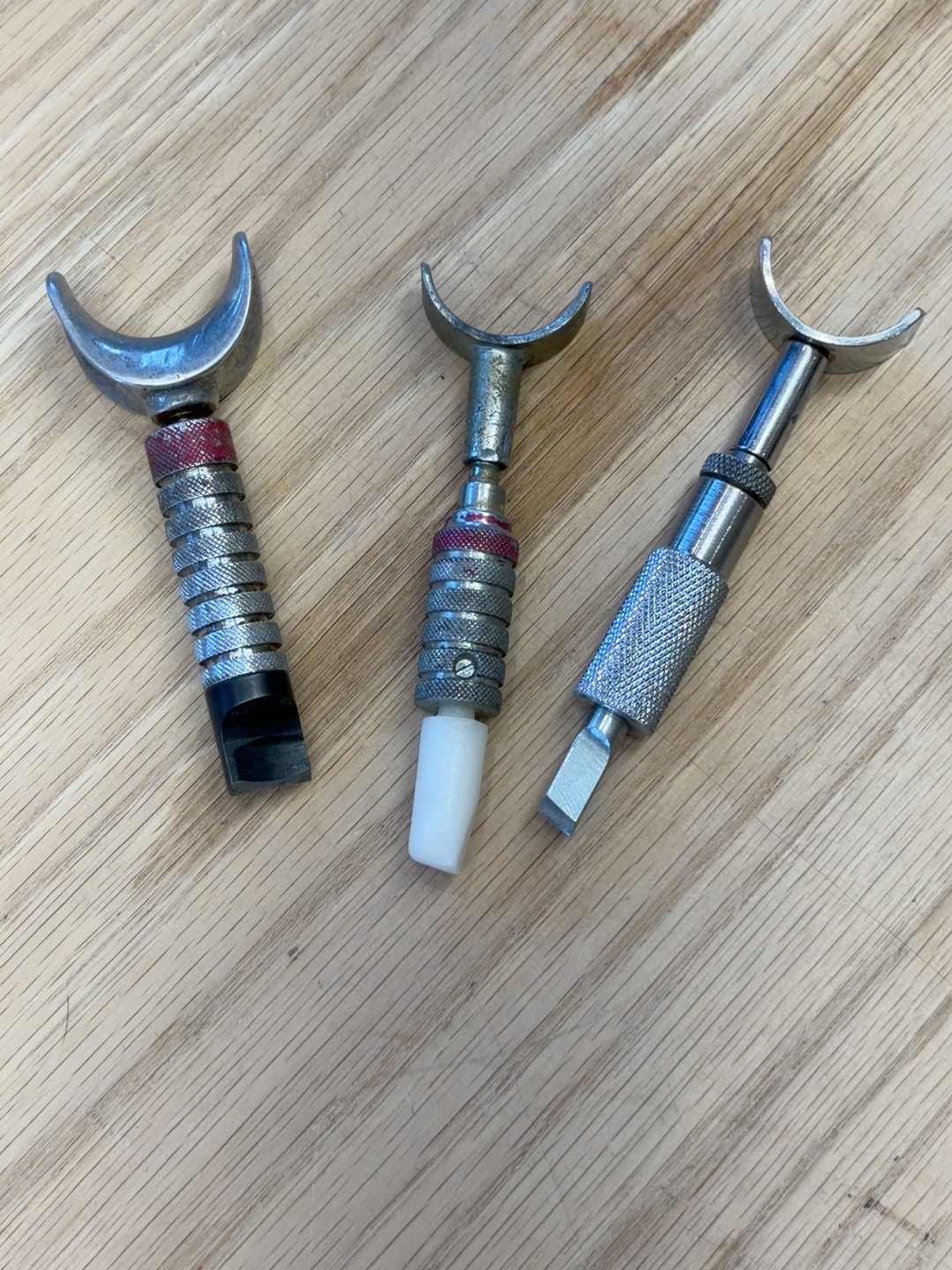 Three Leather Swivel Knives
