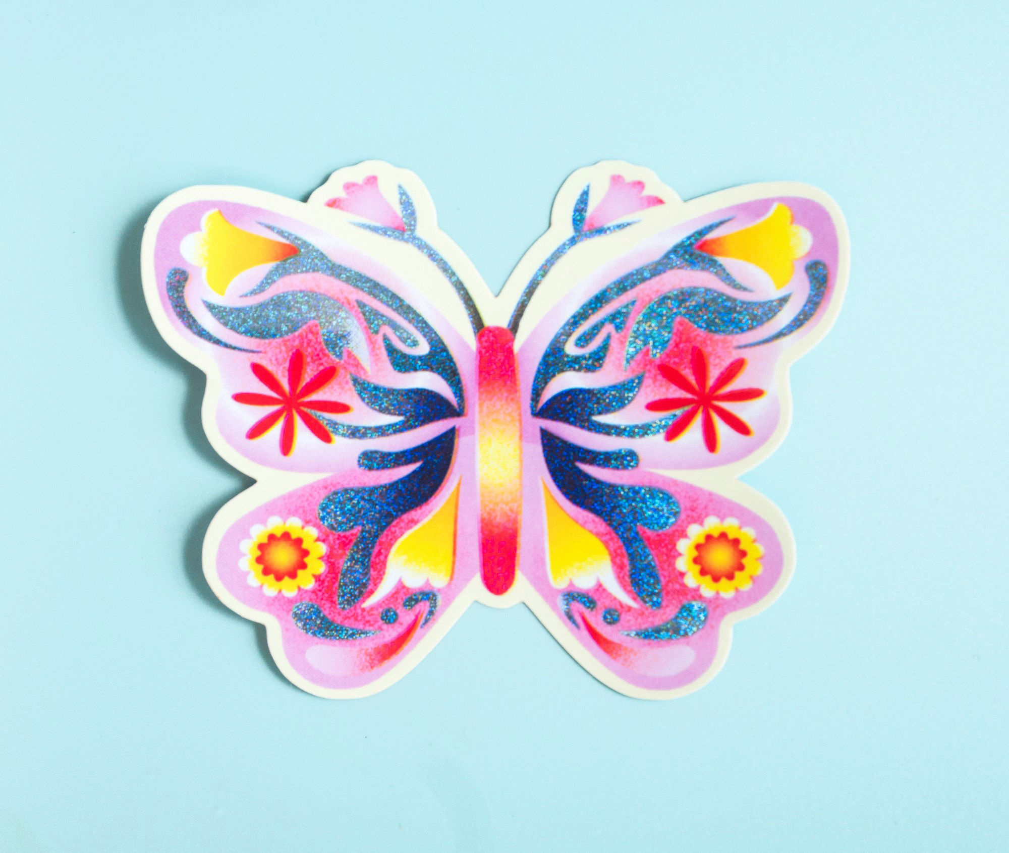 Grote lila glitter vlinder sticker met bloemen