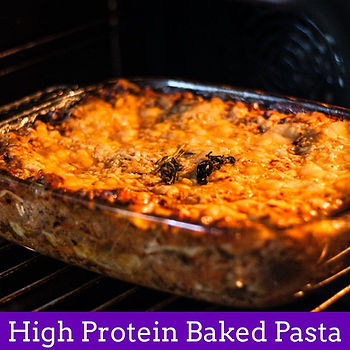 Baked pasta with golden crust in an oven. Aromatic herbs on top. Text: "High Protein Baked Pasta" on a purple strip.