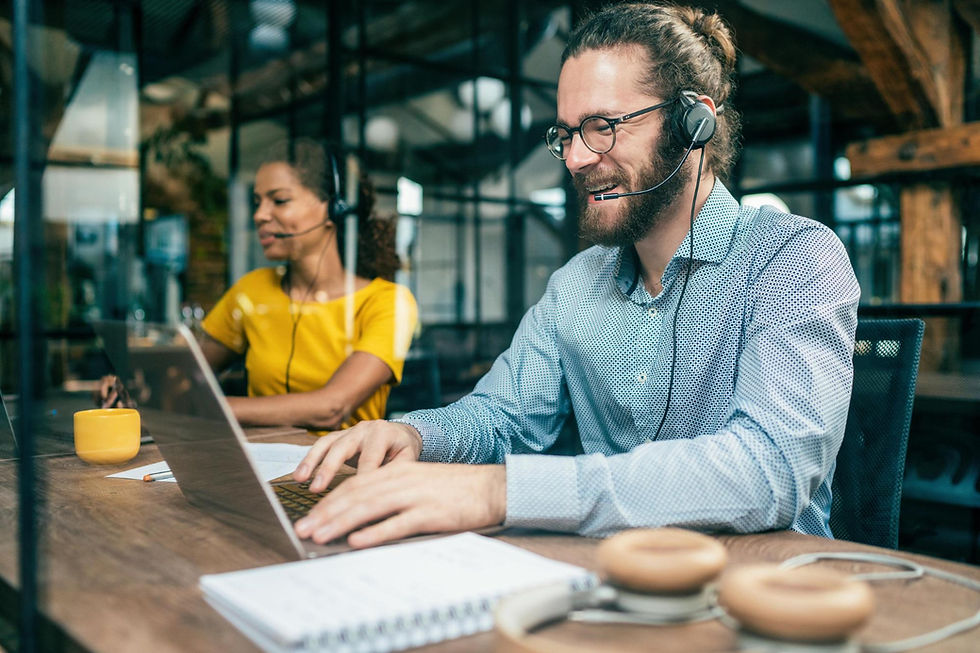 Customer support workers sitting at their desks