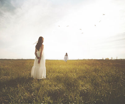 surreal image of a woman who imagines herself in front of her walking towards the infinite