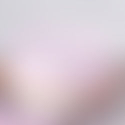Image of cake white in colour with black dots on it