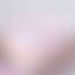 Image of cake white in colour with black dots on it