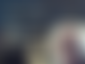 People celebrating against a backdrop of trees; a man extends his hand in the foreground. Text reads "The Kingfisher Pod" with a microphone icon.