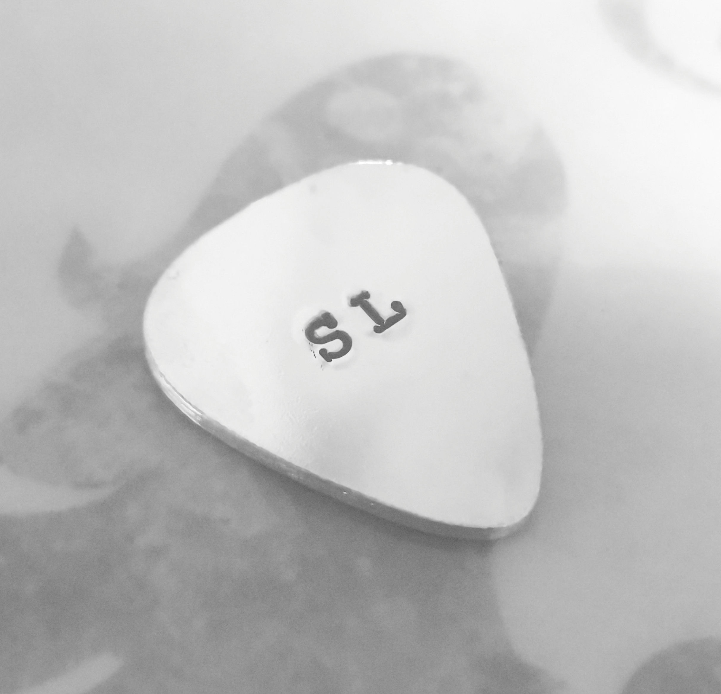 Initial(s) : Guitar Pick 