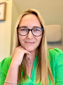 Josie Hescott sat at her desk