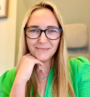 Josie Hescott sat at her desk