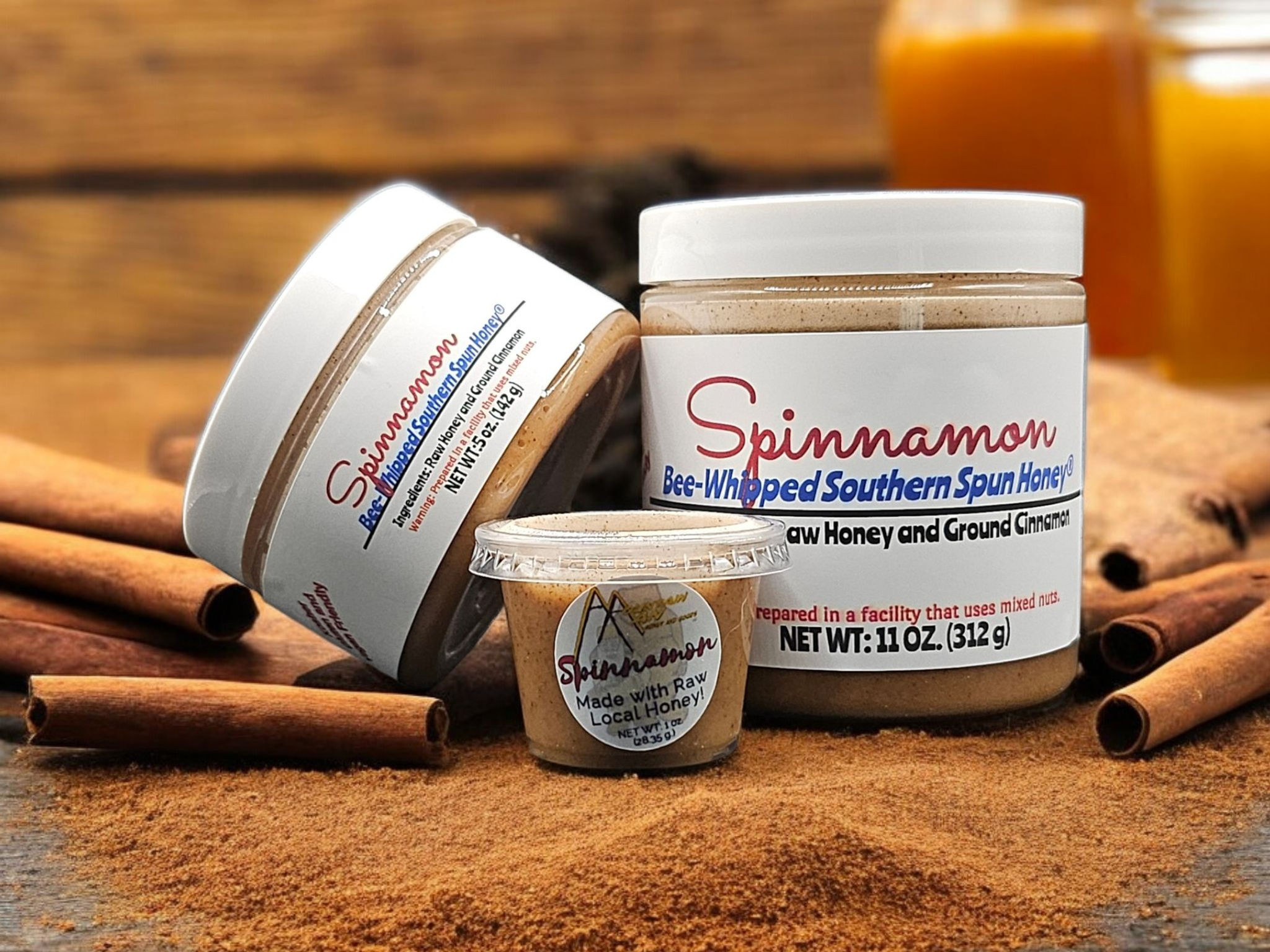 Three sizes of Spinnamon Bee-Whipped Southern Spun Honey. Front View