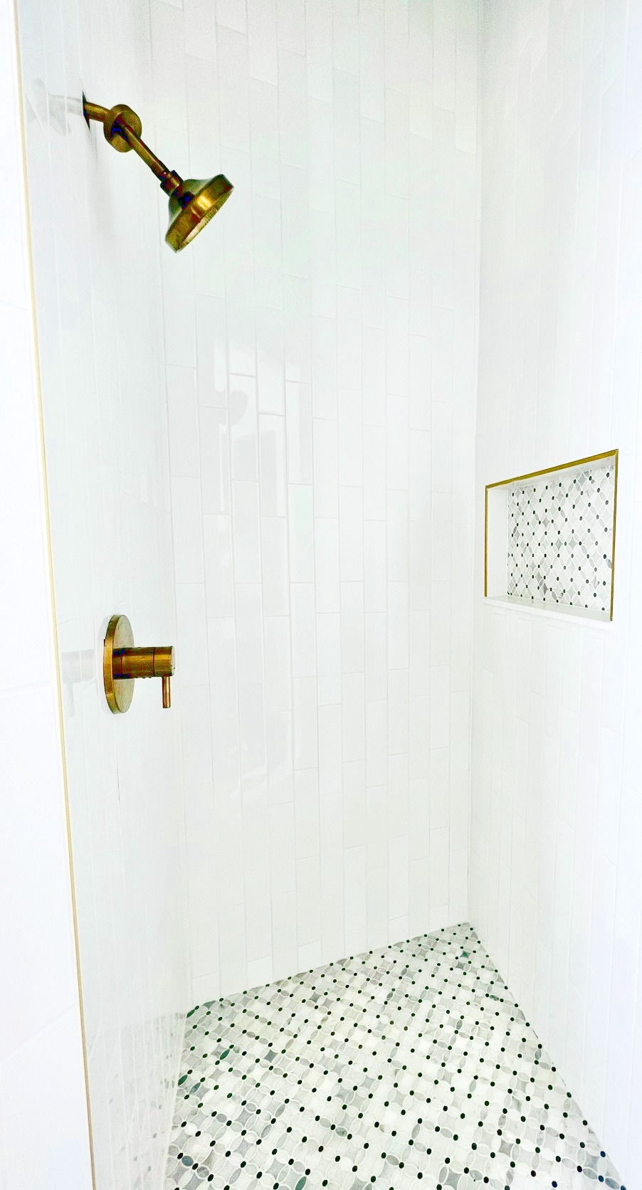 White and gold shower, subway tile, tile ideas, tile contractor, tile installer.