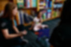 child smiling in learning environment