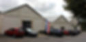Cars parked in front of the Fargo Road Larkhill hangars