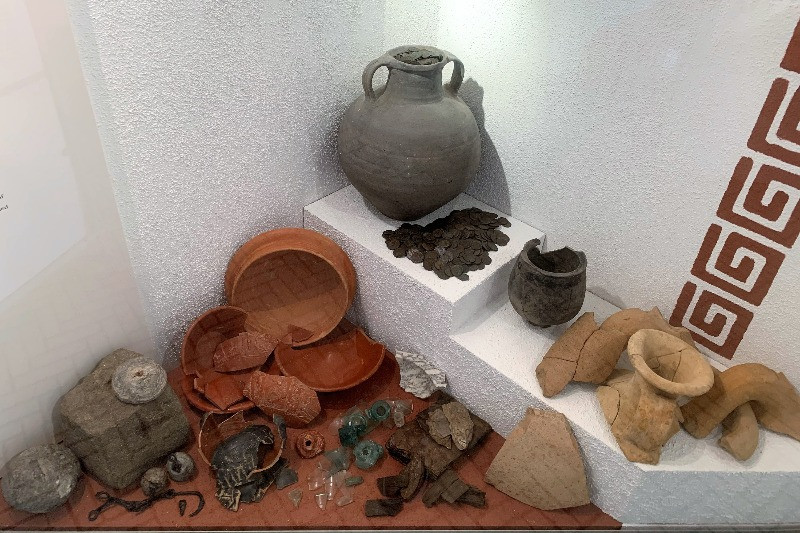 Urns filled with coins