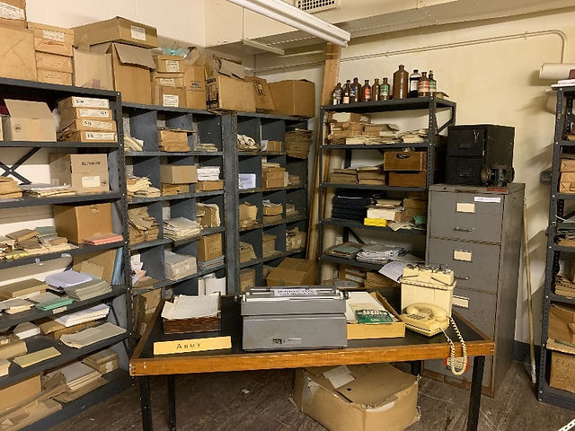 Shelves covered in aging stationery
