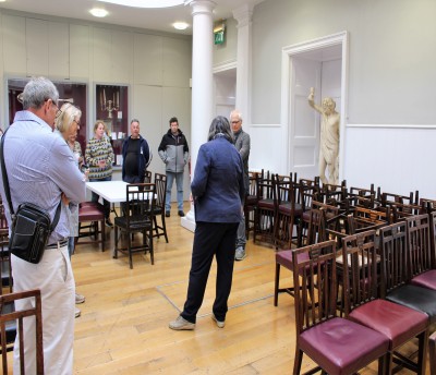 A tour group in the old court room