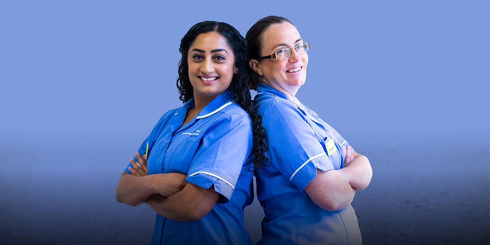 Two NHS nurses in blue uniforms standing back to back with arms folded and smiling, used as the hero image for the NHS Croydon Trust Bring Us Your Superpower recruitment campaign case study by Julie Nicholls