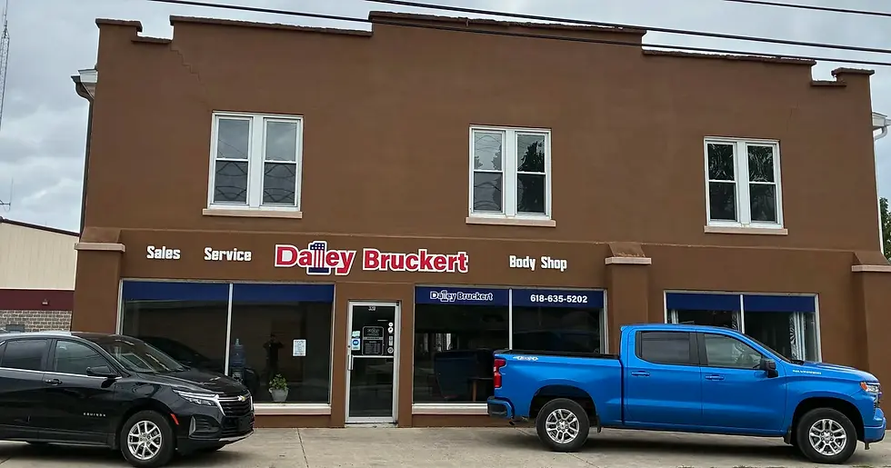 Wide exterior shot of the Daley Bruckert Chevrolet dealership building