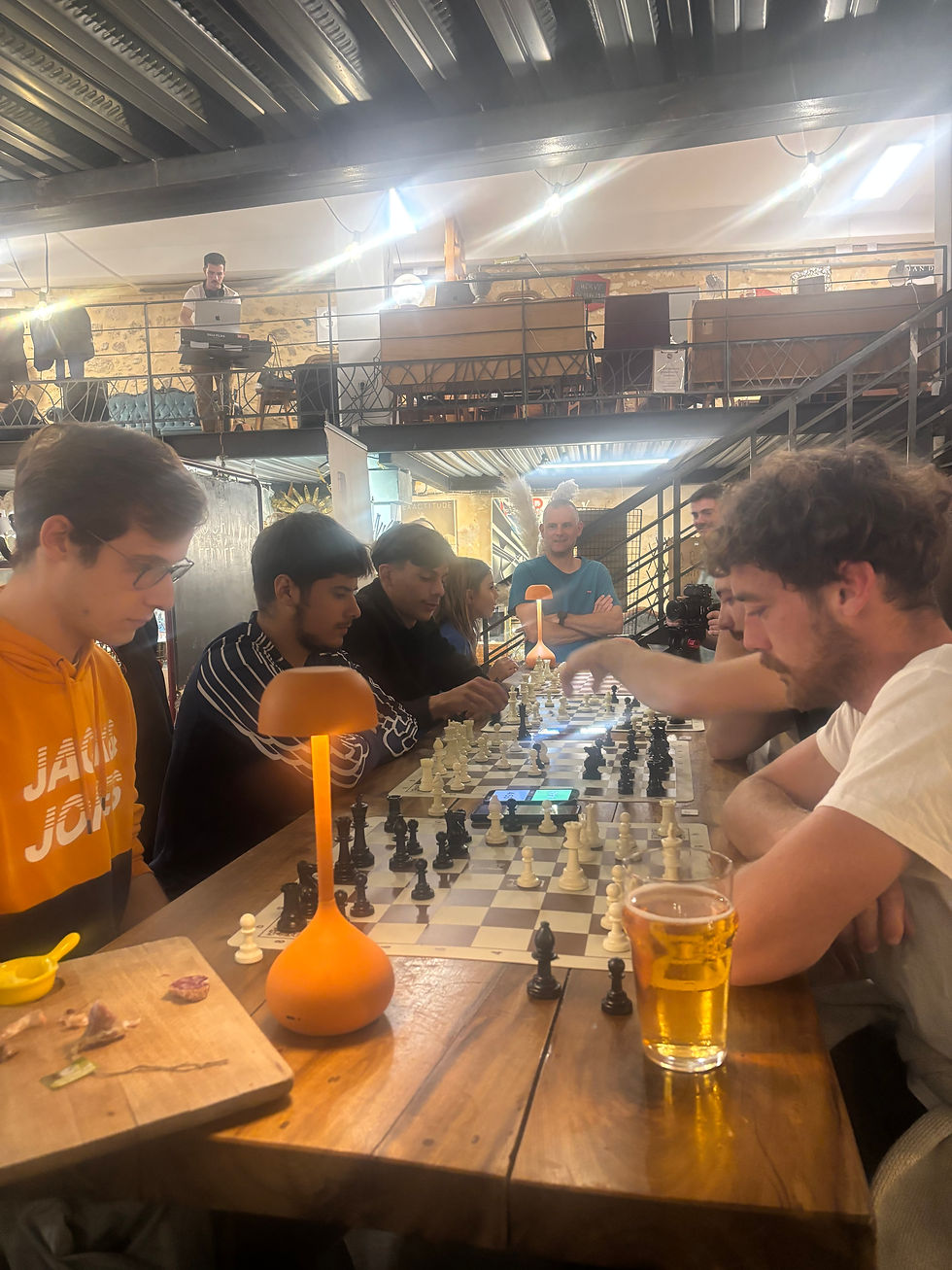 Players focused at a ChessBar meetup