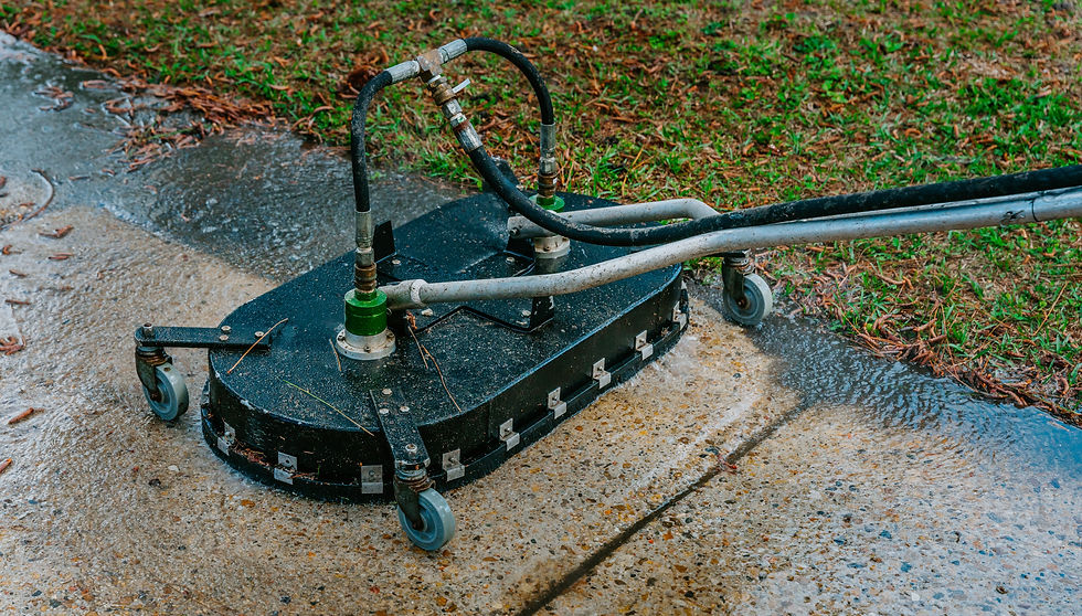 Surface cleaning concrete driveway.