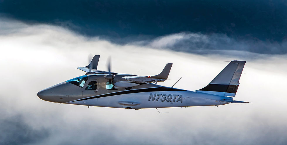 twin tecnam used for multi-engine training flying near cloud layer