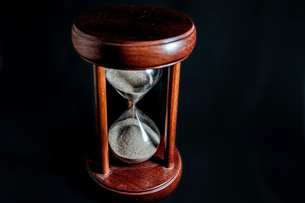 Hourglass with sand running through it, representing how long does SEO take to show results