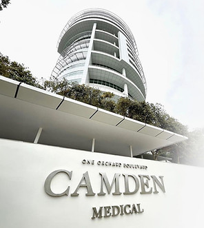 Camden Medical Centre building and entrance signage at 1 Orchard Boulevard, Singapore, where The Straits Eye Centre is located.