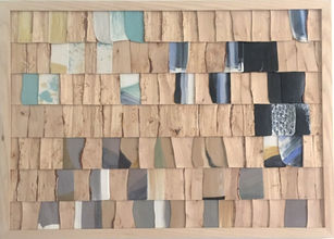 Relief work made out of wood and ceramic.