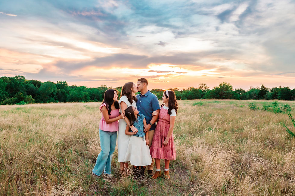 family with a beautiful sunset enjoying time together for Outdoor Family Photos in Frisco TX by Christie Gare Photography