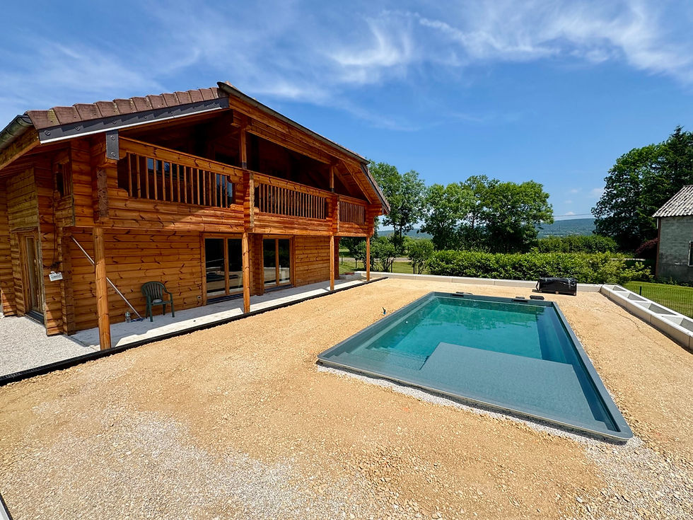 Thumbnail: Piscine de 7,30 x 3,90 modèle Bay 77 Ceramic de Luxe en cours d'aménagement avec notre équipe La Batisse à Rahon