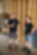 pikes beer brewers standing in front of pallets enjoing a beer and chat