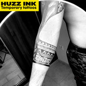 maori armband tattoo design by Huzz Ink tattoo shop in Dubai