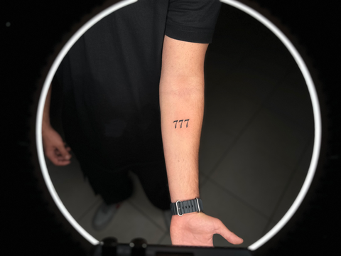 777 tattoo