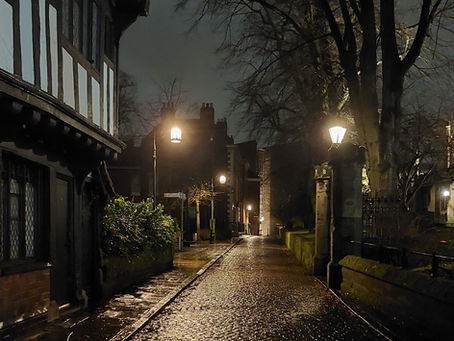 A rain-soaked street in Coventry, England.