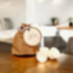 mom's coffee cake wax tart bag on a wood countertop.