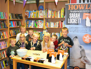 Sarah promotes 'Howl!' with a book reading at local bookshop Walter Henry's.