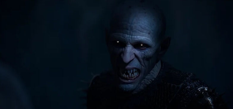 réature vampire terrifiante aux yeux luisants et au visage déformé, incarnant les menaces surnaturelles de The Blood of Dawnwalker.