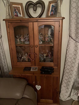 Display cabinet witth dark lacquer before renovation