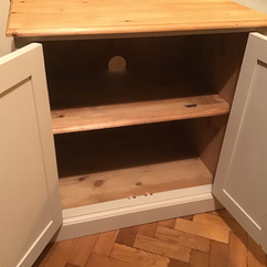 Open cabinet doors painted on inside