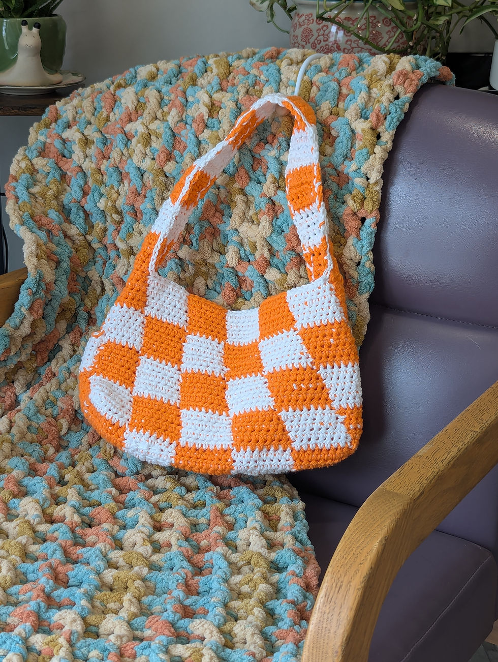 Orange and white checkered purse