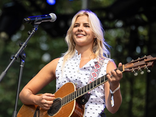 Bebe Stockwell playing Bumbershoot last August, – photo by Kirk Stauffer for Guitar Girl Magazine