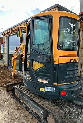 Digger with osprey logo on