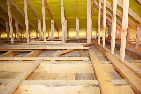 depositphotos_275445384-stock-photo-wooden-roof-beams-rafters-trusses.jpg