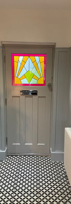Stained glass and smart lock on a front entrance