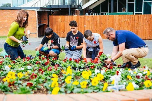 The team hard at work in the Ellerslie Event Centre ANZAC garden