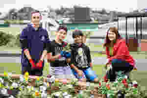 A job well done. Award-winning designer Xanthe White with the Ellerslie Primary School pupils who helped bring her garden design to life at Auckland's Ellerslie Event Centre