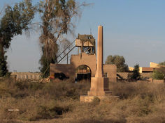 Habbaniya War Cemetery 2005, view of the main entrance looking to the North from the damaged Cross of Remembrance