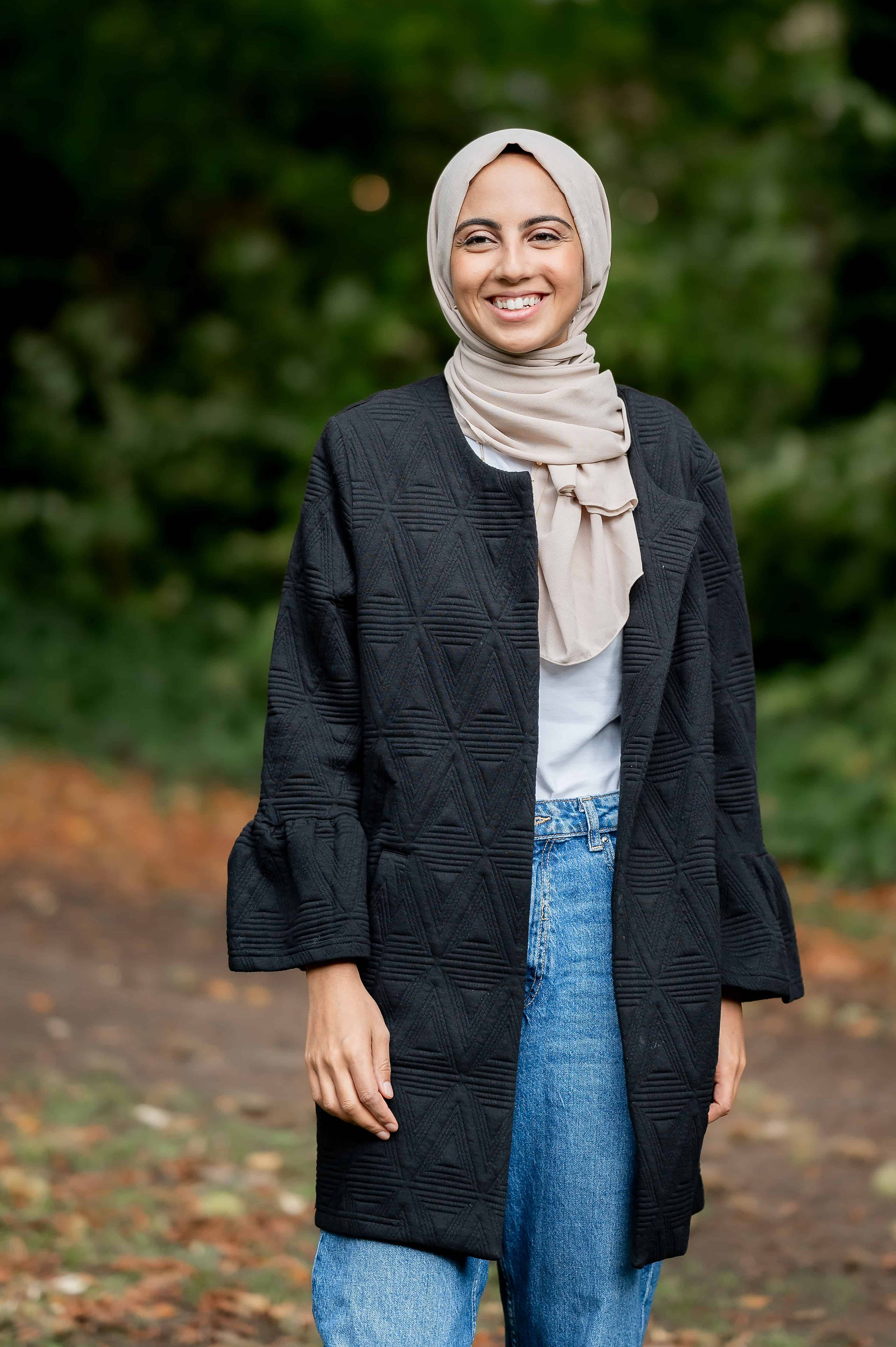 Muslim nutritionist, Hend Ahmed's business headshot at Liverpool park.