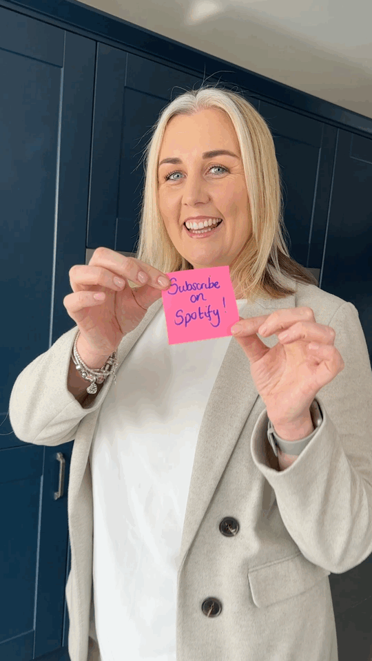 GIF of Woman holding pink post-it saying 'subscribe on spotify' 