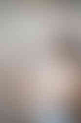 Abeni Lane founder reviewing printed brand materials during her Liverpool branding shoot.