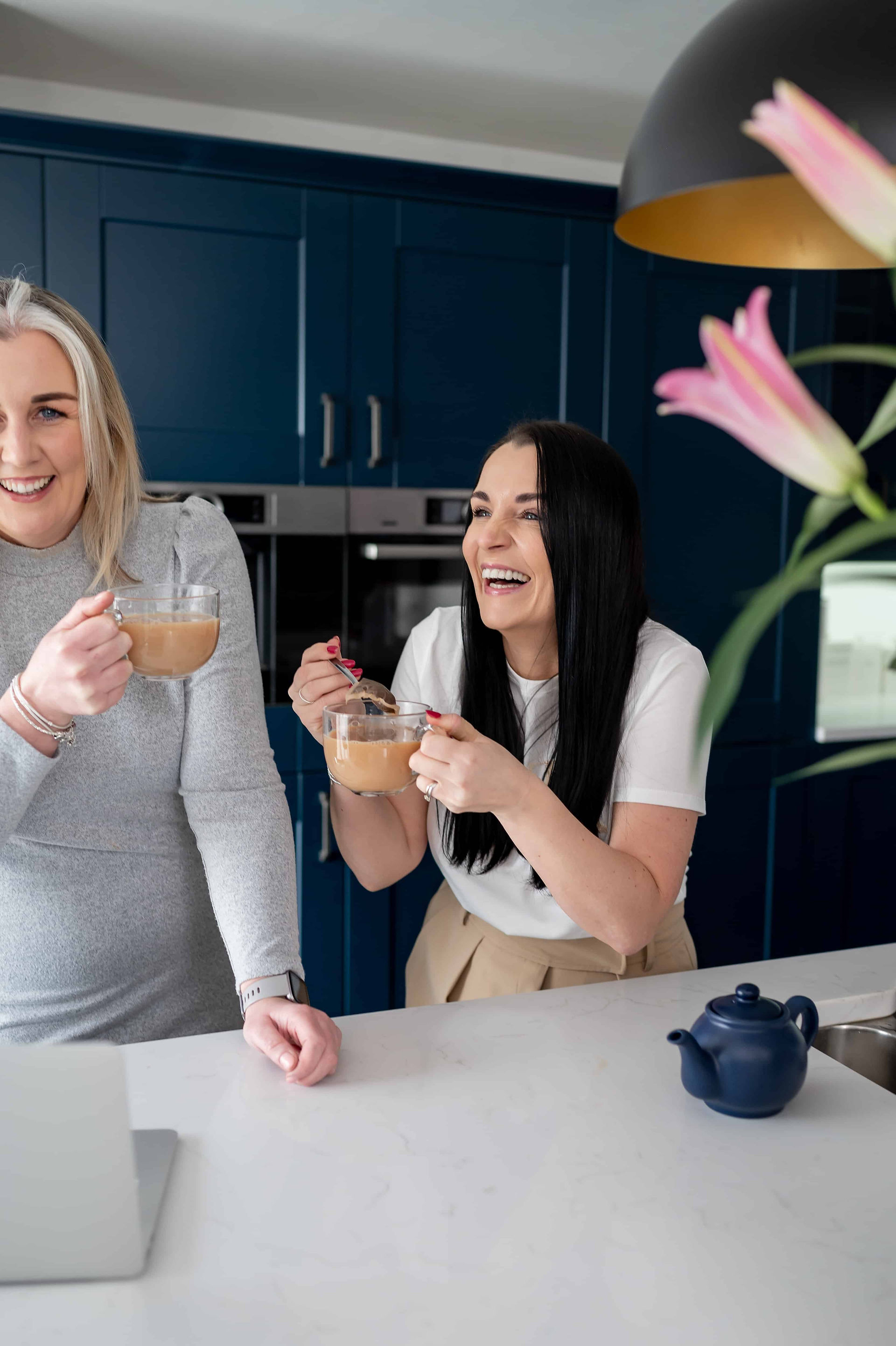 Leading Ladies in Business Founders Clare and Cal laughing while steeping their tea.