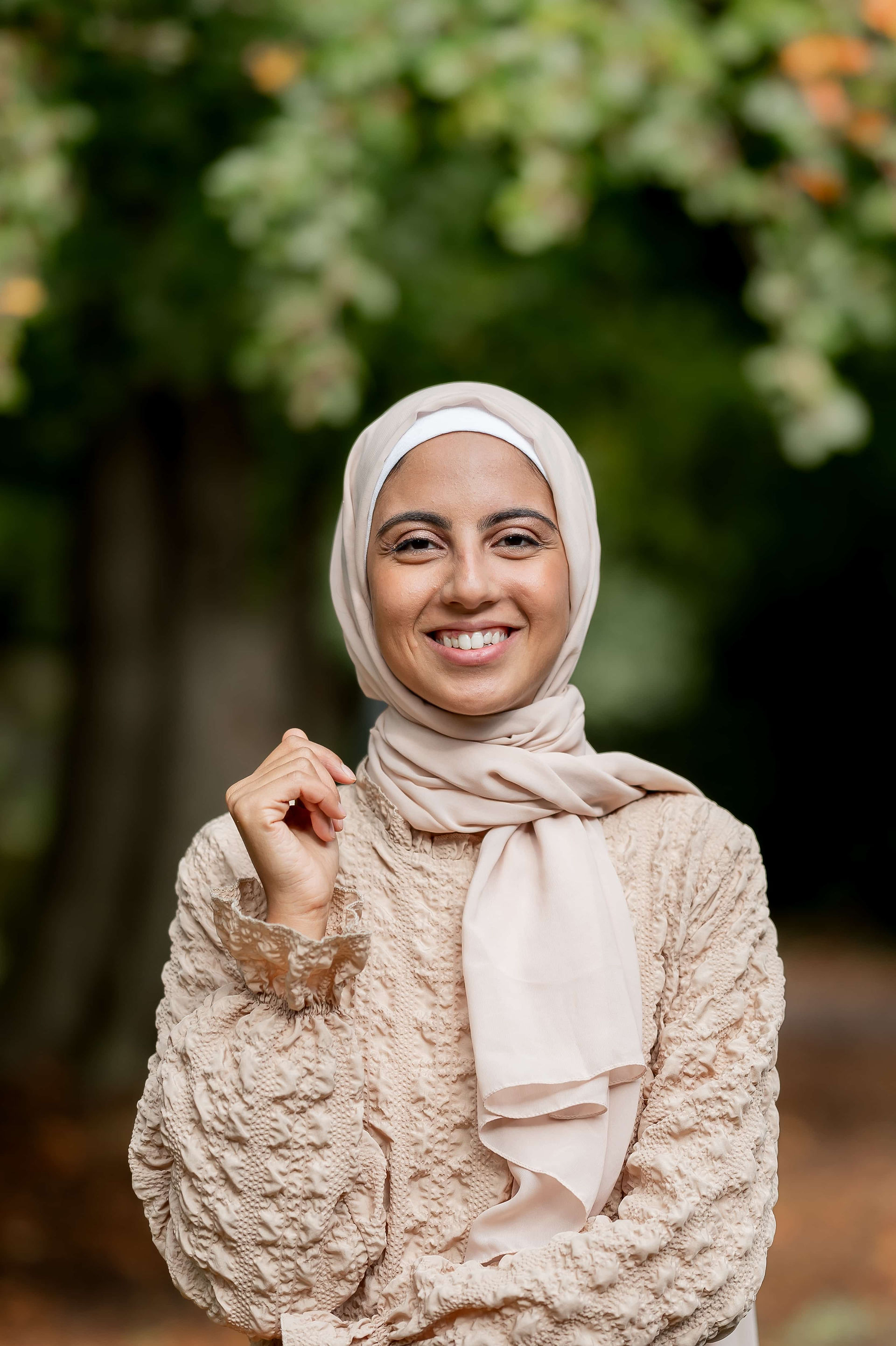 Muslim nutritionist headshot at Liverpool park.